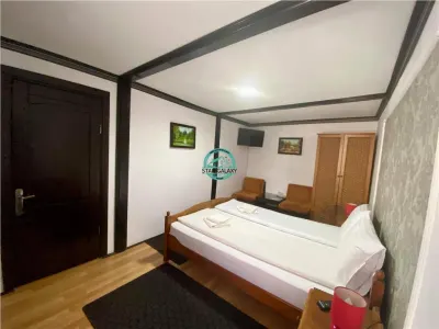 VAND PENSIUNE CU 7 CAMERE IN SIGHISOARA LA 800 MP DE CETATE - foto 13