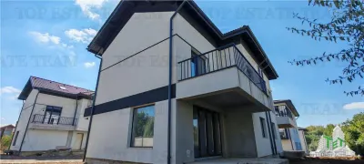 Vila individuala cuplata, in complex rezidential modern, cu 5 camere si mansarda de 77mp, 240mp teren, cu toate utilitatile, langa Parc Bragadiru - Bragadiru