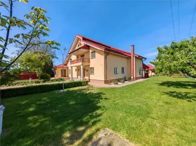 Casa P+E de vanzare in Lilieci – 3.350mp teren intravilan, livada, 2 garaje, panouri solare - Lilieci