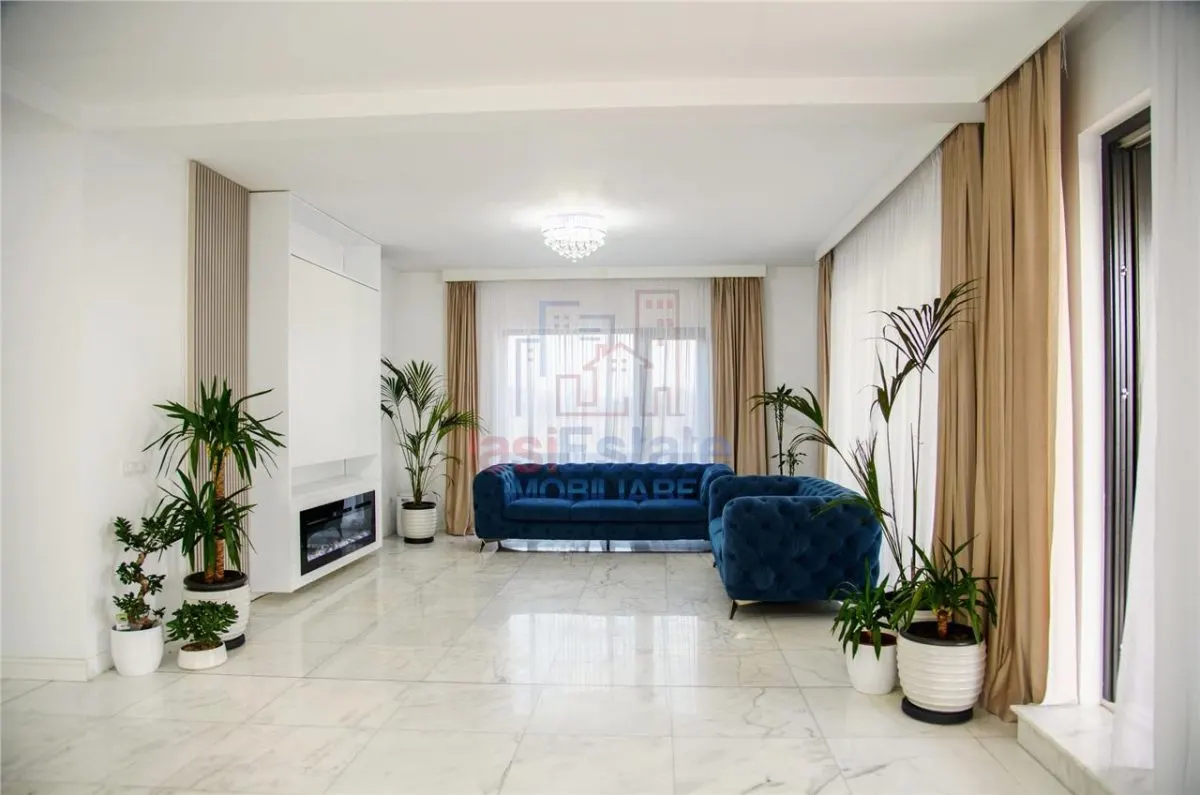 Casa intr-o zona linistita cu garaj si teren-1091 mp - foto 3