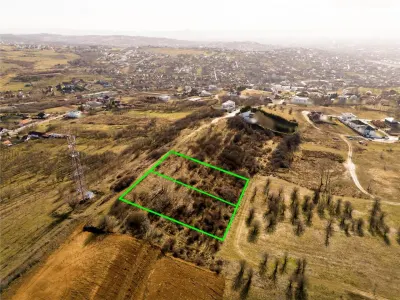 RECO Teren  intravilan- panorama asupra orasului -str. Caisilor - foto 1