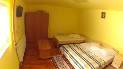 Pensiune in Arieseni cu 7 camere - foto 9