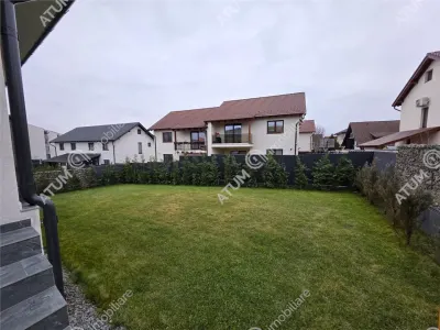 Casa individuala de vanzare cu 4 camere decomandate curte libera de 330 mp si garaj la demisol in comuna Selimbar din Sibiu - foto 5