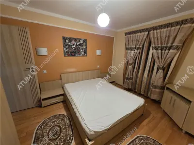 De inchiriat apartament cu 3 camere decomandate 2 balcoane si loc parcare situat in zona Tilisca din Sibiu - foto 7