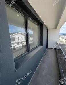 Casa de vanzare cu 4 camere 2 bai 2 balcoane si curte libera de 50 mp situata in zona Calea Cisnadiei din Sibiu - foto 14