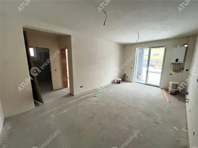 De vanzare apartament intabulat cu 2 camere decomandate balcon si loc de parcare situat in Talmaciu/ Sibiu - foto 2