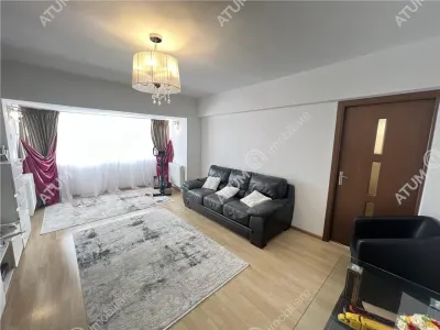 De vanzare apartament mobilat si utilat cu 3 camere 2 bai pivnita situat in zona Turnisor din Sibiu - foto 2