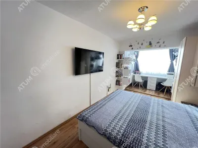 De vanzare apartament mobilat si utilat cu 3 camere 2 bai pivnita situat in zona Turnisor din Sibiu - foto 5