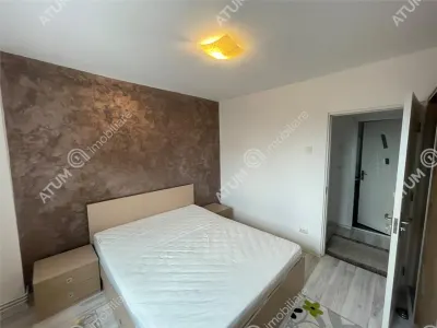 De inchiriat apartament modern cu 2 camere decomandate si balcon tip loggie in zona Mihai Viteazu din Sibiu - foto 4