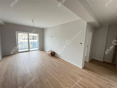 De vanzare apartament la cheie cu 3 camere decomandate 2 bai 2 balcoane si loc parcare in zona Pictor Brana Selimbar - Sibiu