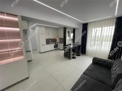 De inchiriat apartament tip penthouse cu 2 camere terasa si loc de parcare in zona Calea Surii Mici din Sibiu - foto 2