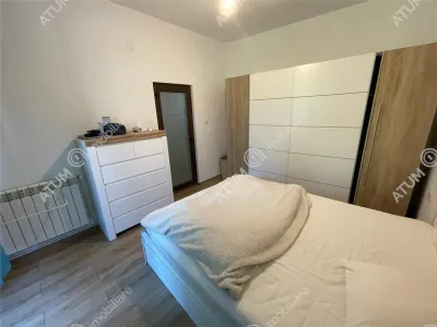 De vanzare apartament cu 2 camere cu balcon garaj curte si 2 pivnite in zona ultracentrala din Sibiu - foto 6
