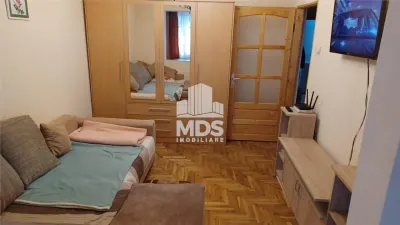 Decomandat cu 2 bai, 3 balcoane la etajul 2 cu garaj sub bloc - Timisoara