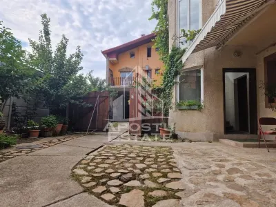 Casa familiala cu spatiu comercial si garaj P+1E+M 720 Mp - foto 20