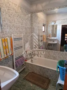 Casa familiala cu spatiu comercial si garaj P+1E+M 720 Mp - foto 23